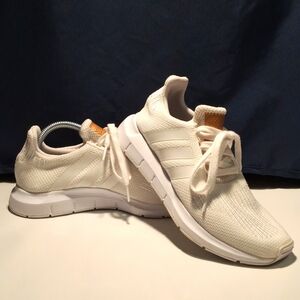 Addidas ultraboost 3.0 triple white running shoes.